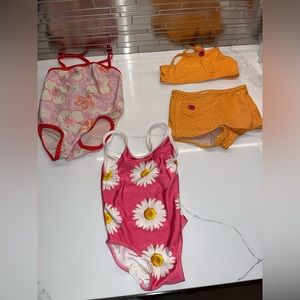 Three gently loved 18 month old bathing suits